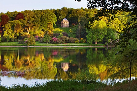 STOURHEAD_LANDSCAPE_GARDEN__WILTSHIRE_THE_NATIONAL_TRUST_MAY_2012__REFLECTIONS_ON_THE_LAKE_WITH_VIEW