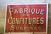 LES JARDINS DE ROQUELIN  LOIRE VALLEY  FRANCE: THE GARDEN SHOP - VINTAGE FRENCH JAM SIGN