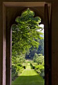 PAINSWICK ROCOCO GARDEN  GLOUCESTERSHIRE: VIEW OUT OF THE FRONT DOOR OF THE RED HOUSE