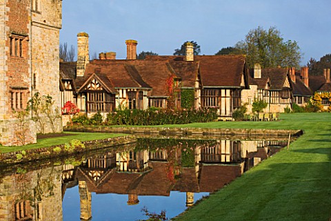 HEVER_CASTLE__KENT__AUTUMN_VIEW_OF_THE_ASTOR_WING_REFLECTED_IN_THE_MOAT__REFLECTION