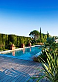 AFRICAN GARDEN  PROVENCE  FRANCE: DESIGNER DOMINIQUE LAFOURCADE: DECKING AND  WATER FOUNTAINS -  THE SWIMMING POOL