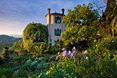 VILLA FORT FRANCE  GRASSE  FRANCE: VIEW OF THE VILLA WITH IRISES IN THE FOREGROUND
