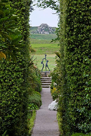 TRESCO_ABBEY_GARDEN__TRESCO___ISLES_OF_SCILLY_VIEW_DOWN_THE_NEPTUNE_STEPS_PAST_HEDGES_OF_QUERCUS_ILE