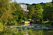 GLYNDEBOURNE, EAST SUSSEX: VIEW ACROSS THE LAKE TO THE OPERA HOUSE - WATER, LANDSCAPE