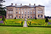 SLEDMERE HOUSE GARDEN, YORKSHIRE: SLEDMERE HOUSE WITH ITS ITALIANATE PARTERRE - CLASSIC, COUNTRY GARDEN, SUMMER, AUGUST, FORMAL, CLIPPED, TRIMMED, TOPIARY, BOX