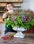 CHATEAU DE CHENONCEAU  FRANCE: FLORIST DAVID HOGUET MAKES A FLORAL ARRANGEMENT FOR THE CHATEAU FROM HYDRANGEAS AND GRASSES CUT FROM THE CUTTING GARDEN