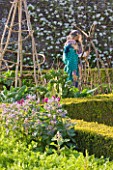 ARUNDEL CASTLE GARDENS  WEST SUSSEX: THE COLLECTOR EARLS GARDEN: THE ORGANIC KITCHEN GARDEN WITH BORAGE AND SCARECROWS