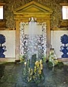ARUNDEL CASTLE GARDENS  WEST SUSSEX: THE COLLECTOR EARLS GARDEN: INTERIOR OF OVBERONS PALACE. STALAGMITE FOUNTAIN SUPPORTS A GOLDEN CORONET