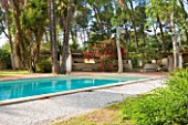SICILY  ITALY: LA CASE BIVIERE NEAR LENTINI - THE POOL SURROUNDED BY EXOTIC TREES