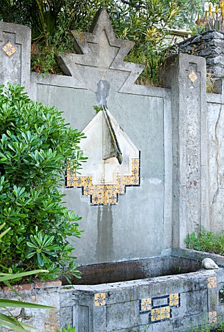 SICILY__ITALY_CASA_CUSENI_IN_TAORMINA__THE_MERIDIAN_FOUNTAIN__WATER__ORNAMENT__SPOUT__WALL_MOUNTED