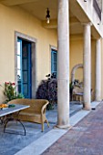 SICILY  ITALY: CASA CUSENI IN TAORMINA - TERRACOTTA AND MARBLE TILED TERRACE / PATIO WITH WRATTEN SEAT / CHAIR / BENCH - MEDITERRANEAN