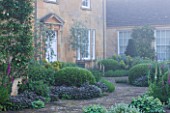 ROCKCLIFFE HOUSE, GLOUCESTERSHIRE: THE  - GREEN, COUNTRY GARDEN, ROMANTIC, MIST, FOG - TERRACE / PATIO WITH FOXGLOVES, SAGE AND ALCHEMILLA MOLLIS