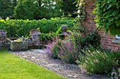 BIRTSMORTON COURT, WORCESTERSHIRE: TERRACE BESIDE THE HOUSE WITH LAWN AND STONE PATH BESIDE THE HOUSE - SUMMER, JUNE, ENGLISH GARDEN, CLASSIC