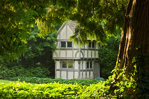 BIRTSMORTON_COURT_WORCESTERSHIRE_SMALL_WENDY_HOUSE_IN_THE_WOODS__GARDEN_ORNAMENT_SUMMER_WOODLAND_BUI
