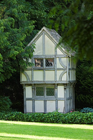 BIRTSMORTON_COURT_WORCESTERSHIRE_SMALL_WENDY_HOUSE_IN_THE_WOODS__GARDEN_ORNAMENT_SUMMER_WOODLAND_BUI