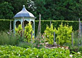 POULTON HOUSE GARDEN, WILTSHIRE: TIMBER AND LEAD PAVILLION IN THE KITCHEN GARDEN WITH SWEET PEAS