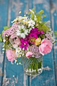 COMMON FARM FLOWERS, SOMERSET, SUMMER: FRESHLY CUT FLOWERS IN GLASS CONTAINER ON BLUE BENCH / TABLE - FLOWER, BOUQUET, DISPLAY, ARRANGEMENT, FLORAL, ROSES, ACHILLEA, NIGELLA