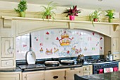 BRILLS FARM  LINCOLNSHIRE: THE KITCHEN WITH TILES PAINTED BY KATE GLANVILLE