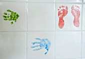 BRILLS FARM  LINCOLNSHIRE: THE KITCHEN WITH TILES PAINTED WITH THE CHILDRENS FEET AND HANDS