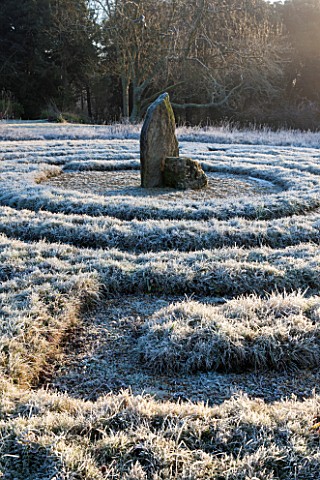 SEDGWICK_PARK_WEST_SUSSEX_WINTER_GREEK_STYLE_GRASS_LABYRINTH_WITH_STANDING_STONE_AND_PEA_SHINGLE_PAT
