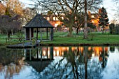 CHIPPENHAM PARK, CAMBRIDGESHIRE: THE HOUSE AND SUMMERHOUSE REFLECTED IN THE LAKE. REFLECTION,  WINTER