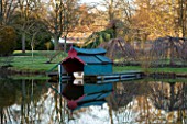 CHIPPENHAM PARK, CAMBRIDGESHIRE: THE BOAT HOUSE REFLECTED IN THE LAKE. REFLECTION,  WINTER