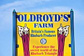 E OLDROYD & SONS, YORKSHIRE : SIGN SHOWING OLDROYDS AS BRITAINS FAMOUS RHUBARB PRODUCER