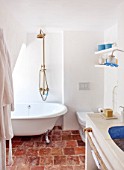 CIUTADELLA MENORCA, SPAIN: EVELYNE MANDEL HOUSE - BATHROOM IN BLUE AND WHITE - SINK, WASHBASIN, WASH BASIN, TAPS, LIGHT, SOAP, TOILET, BATH, CLASSIC ROLL TOP, SHOWER, FREE STANDING