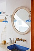 CIUTADELLA MENORCA, SPAIN: EVELYNE MANDEL HOUSE - BATHROOM IN BLUE AND WHITE - SINK, WASHBASIN, WASH BASIN, TAPS, LIGHT, SOAP
