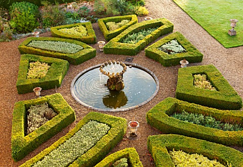 LAMPORT_HALL_NORTHAMPTONSHIRE_AERIAL_VIEW_LOOKING_DOWN_ONTO_THE_ITALIAN_GARDEN_WITH_BOX_PARTERRES_GR