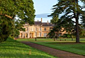 LAMPORT HALL, NORTHAMPTONSHIRE: THE HALL WITH LARGE CEDAR TREE ON LAWN - FORMAL, HISTORIC HOUSE, AUGUST, SUMMER, ENGLISH COUNTRY GARDEN