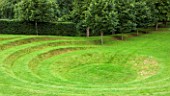 GREAT FOSTERS. SURREY: LANDFORM BY KIM WILKIE - AMPHITHEATRE, CIRCLE, ART, HISTORIC, LAWNS, GRASS, PATTERN