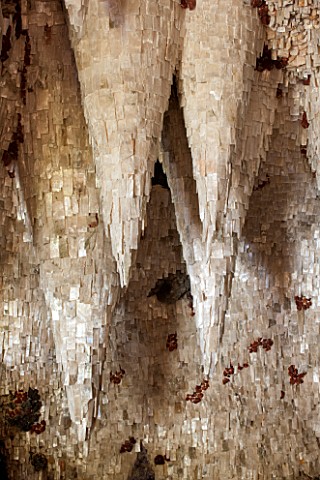PAINSHILL_PARK_SURREY_THE_CRYSTAL_GROTTO__CLOSE_UP_OF_CRYSTALS_PLASTERED_TO_WOODEN_CONES_ON_CEILING_