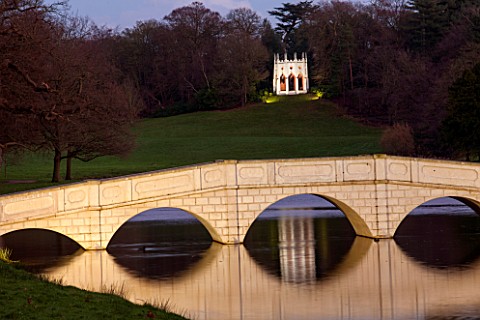PAINSHILL_PARK_SURREY_THE_FIVE_ARCH_BRIDGE_AND_GOTHIC_TEMPLE_LIT_UP_AT_NIGHT__LIGHTING_FOLLY_FOLLIES
