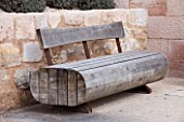 MUCEM, MARSEILLES, FRANCE: THE JARDIN DE MIGRATIONS, FORT SAINT - JEAN. RUSTY METAL AND WOOD BENCH. SEAT, A PLACE TO SIT, TERRACE, PATIO, MEDITERRANEAN