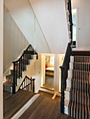 SALLY STOREY HOUSE, LONDON: STAIRCASE REFLECTED IN MIRROR - REFLECTION, REFLECTIONS