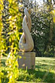 ULTING WICK, ESSEX: SCULPTURE IN THE GARDEN IN APRIL - LAWN, STONE, ART,  SPRING
