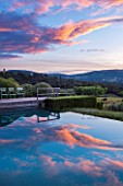 LA JEG, PROVENCE, FRANCE: DESIGNER ANTHONY PAUL - SWIMMING POOL AND REFLECTION OF SKY. MAY, MEDITERRANEAN, WATER, ORNAMENT, GARDEN, REFLECTIONS, REFLECTED
