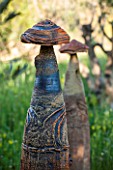 LA JEG, PROVENCE, FRANCE: DESIGNER ANTHONY PAUL - MEADOW WITH TERMITE HILL SCULPTURE. ORNAMENT, SPRING, MAY, ART, ARTISTIC