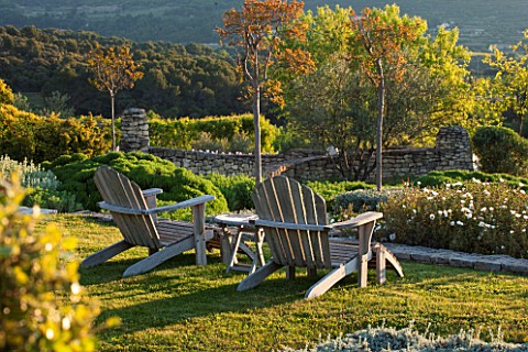 LA_JEG_PROVENCE_FRANCE_DESIGNER_ANTHONY_PAUL__WOODEN_ADIRONDACK_CHAIRS_ON_LAWN_BENCH_LOUNGER_LOUNGER