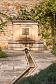 LA JEG, PROVENCE, FRANCE: DESIGNER ANTHONY PAUL - WALLED GARDEN WITH RILL AND FOUNTAIN. PAVING, STONE, MEDITERRANEAN, WATER, GARDEN, SPRING, MAY