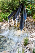 CHELSEA FLOWER SHOW 2016: TELEGRAPH GAREDEN DESIGNED BY ANDY STURGEON -METAL WATER SPOUTS - FOUNTAIN, WATER FEATURE