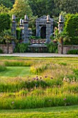 ARUNDEL CASTLE GARDENS, WEST SUSSEX: LAWN WITH MEADOW OF GRASSES AND ALLIUM CHRISTOPHII - BULB, BULBS, SUMMER, COLLECTOR EARLS GARDEN, JULIAN AND ISABEL BANNERMAN