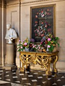 CHATSWORTH HOUSE, DERBYSHIRE: FLORABUNDANCE - THE PAINTED HALL; GILDED TABLE WITH FLORAL ARRANGEMENTS AND STILL LIFE IN FLOWERS PAINTING BY JEAN-BAPTISTE MONNOYER