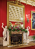 CHATSWORTH HOUSE, DERBYSHIRE: FLORABUNDANCE-THE GREAT DINING ROOM; FIREPLACE DRESSED WITH BORDER OF FOXGLOVES,ALLIUMS,HONESTY AND PEONIES. INTERIOR,GRAND,SUMPTUOUS,OPULENT.