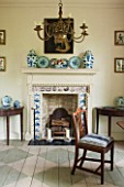 GREYHOUNDS, BURFORD, OXFORDSHIRE: THE READING ROOM. DECORATED WITH OLD DELFT AND IRISH GEORGE 11 EMBOSSED BIRD PICTURES. FIREPLACE, DESK & CHAIR, OLD CHANDELIER, PAINTED WOOD FLOOR