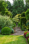 OXLEAZE FARM,OXFORDSHIRE: VIEW FROM TERRACE IN FRONT OF HOUSE WITH BOX DOME, YEW TOPIARY & CORNUS CONTROVERSA VARIEGATA. SUMMER,EVERGREEN
