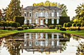 PRIVATE GARDEN, GLOUCESTERSHIRE - DESIGNER ANGEL COLLINS - CANAL AND REFLECTION OF HOUSE IN WATER - SUMMER, REFLECTED, REFLECTIONS, FORMAL, GARDEN, CUNTRY, ENGLISH, EVENING LIGHT