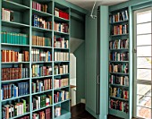 MORTON HALL, WORCESTERSHIRE: SECRET DOOR IN LIBRARY SHELVES LEADING TO GYM