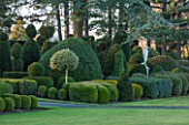 BRODSWORTH HALL, YORKSHIRE: DAWN. WINTER, JANUARY, TOPIARY EVERGREEN, BORDER, FORMAL, GARDEN, COUNTRY, CLIPPED, HEDGE, HEDGES, HEDGING, STATUE